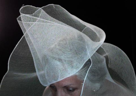 Discarded netting as hat