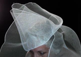 Discarded netting as hat